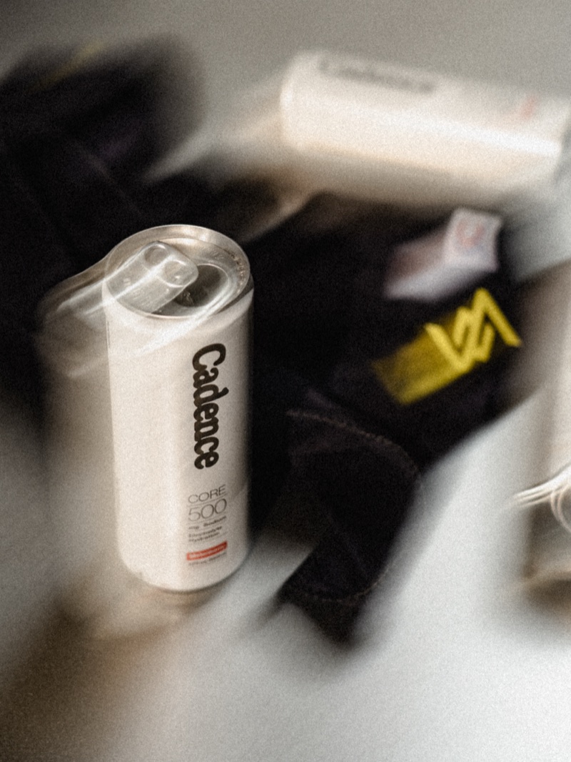Cadence drink can with branded apparel